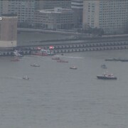 Image de bateaux sur une rivière.