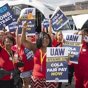 Des membres de l'United Auto Workers lors d’une manifestation à Détroit, au Michigan.