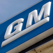 The signage on the outside of General Motors Co.  Flint Assembly on June 12, 2019 in Flint, Michigan. - GM announced the second major expansion of its full-size pickup production capacity this year: with a $150 million investment at Flint Assembly to increase production of the all-new Chevrolet Silverado and GMC Sierra heavy-duty pickups. (Photo by JEFF KOWALSKY / AFP)        (Photo credit should read JEFF KOWALSKY/AFP via Getty Images)