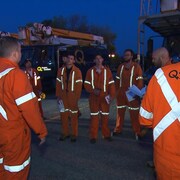 Des monteurs d'Hydro-Québec lors de leur départ pour les États-Unis touchés par l'ouragan Irma