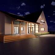 Image conçue par ordinateur du futur marché public. La photo représente le bâtiment de nuit. 