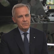 Mark Carney s'adresse à Patrice Roy lors d'une entrevue. 
