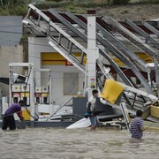 Une station d'essence de Porto Rico lourdement endommagée par l'ouragan Maria.