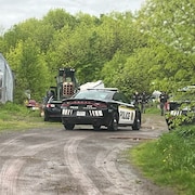 Une voiture de la Sûreté du Québec dans un secteur agricole.