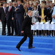 Vladimir Poutine, le 6 juin 2014, lors des commémorations du 70e anniversaire du jour J, à Ouistreham, en France. 