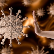 Illustration de la main d'une femme stoppant le coronavirus. =