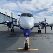 Photo de face d'un avion à hélices de Propair.