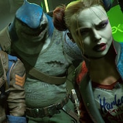 Quatre personnages du jeu Suicide Squad: Kill the Justice League regardent intensément hors cadre dans une image du jeu vidéo.