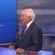 Sophie Bernier et Louis Cloutier sur le plateau de télévision.