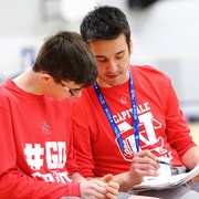 Étienne Chouinard et son entraîneur, Gael Velasco. 