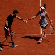Michael Venus célèbre un point avec Bianca Andreescu.