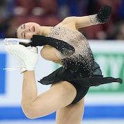 Kaori Sakamoto performe aux Championnats du monde de patinage artistique.
