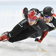 William Dandjinou patine en tête de la course lors de la finale.