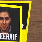 Affiche du visage de Raïf Badawi avec le hashtag #freeraif écrit en bas