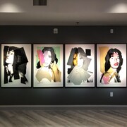 Quatre collage colorés représentant Mick Jagger de l'artiste Andy Warhol.