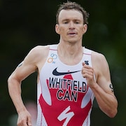 Un courreur au triathlon.