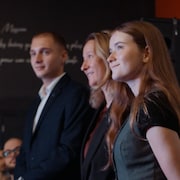 Des participants &agrave; un rassemblement de campagne du PCQ.
