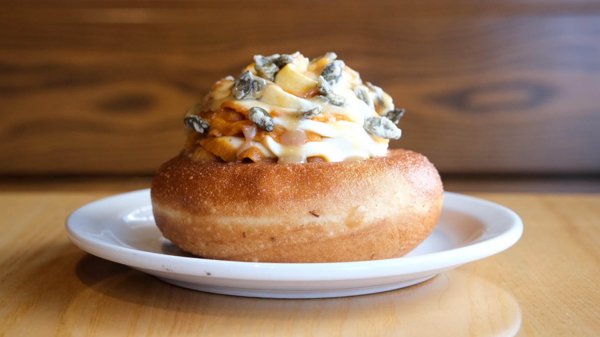 A donut with icing and autumn colors. A donut with icing and autumn colors.