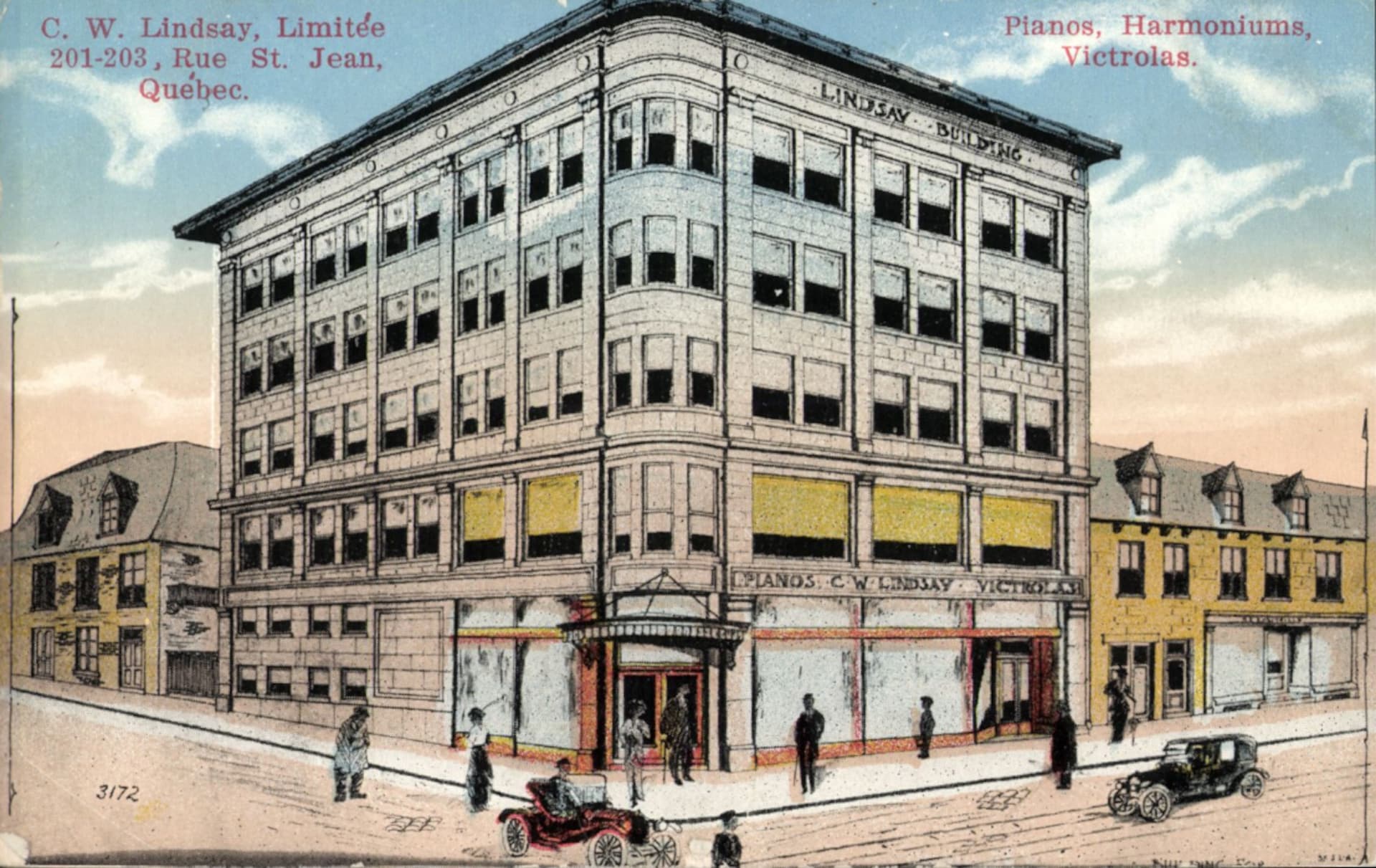 Carte postale colorée montrant un magasin de pianos de la rue Saint-Jean, au tournant des années 1920, avec des marcheurs et des voitures aux alentours. Carte postale colorée montrant un magasin de pianos de la rue Saint-Jean, au tournant des années 1920, avec des marcheurs et des voitures aux alentours.