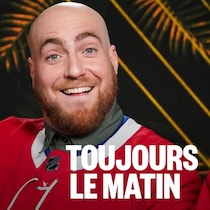 Phil Roy porte un chandail du Canadien de Montréal.