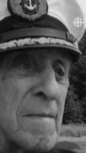 Visage d'Ernest Caron portant sa casquette de capitaine.