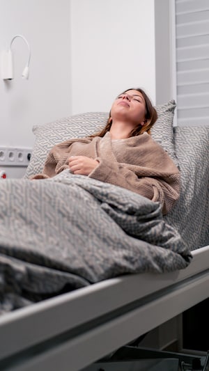 Une femme hospitalisée.