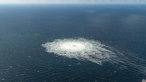 A large disturbance is seen in the waters off the Danish island of Bornholm on Tuesday, after mysterious explosions caused leaks in two natural gas pipelines running from Russia under the Baltic Sea. (Danish Defence Command/The Associated Press)