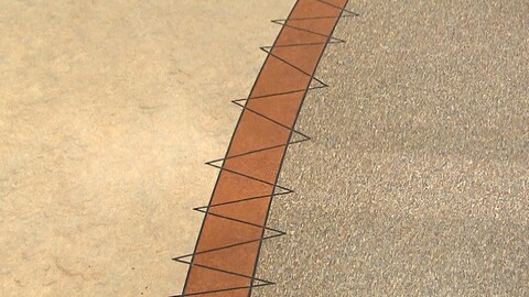Le carrelage forme une série de triangles, comme une couture Le carrelage forme une série de triangles, comme une couture