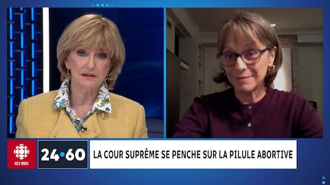 Anne-Marie Dussault discute avec Françoise Girard.