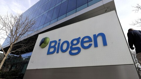 A sign for biotechnology company Biogen is seen on a building in Cambridge, Mass., in 2017. The company has helped develop both lecanemab and the recently approved aducanumab treatment for Alzheimer's, sold as Aduhelm. 