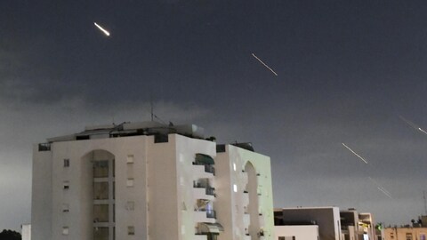 In this image taken from central Israel, the Iron Dome, an Israeli air defense system, is launched to intercept missiles fired from Iran.