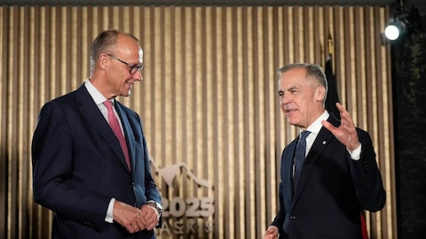 Friedrich Merz and Mark Carney.