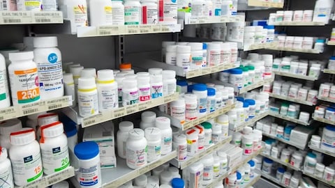 Prescription drugs on shelves at a pharmacy in Montreal. 