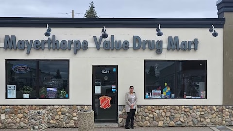 Satya Patel stands in front of her pharmacy in Mayerthorpe, Alta. She moved to Canada 12 years earlier.