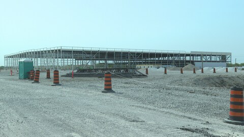 The NextStar EV battery plant in Windsor, Ont., is shown under construction in the summer of 2023. A House of Commons committee on Monday began hearing arguments for and against opening the books on the plant, which is receiving billions in government subsidies.