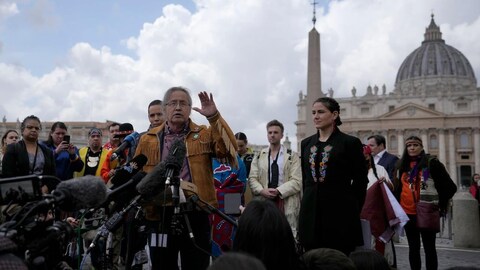 Gerald Antoine, centre, First Nations NWT Regional Chief, is flanked by Natan Obed, president of Inuit Tapiriit Kanatami delegation, left, and Cassidy Caron, President of the Metis community, as they meet reporters in St. Peter's Square at the Vatican, after their meeting with Pope Francis, Friday, April 1, 2022.
