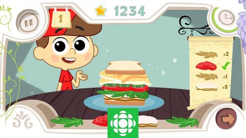 Une image de l'appli L'aventure des magichefs : le petit garçon montre un sandwich avec plein de couches : tomates, salades, pain, fromage
