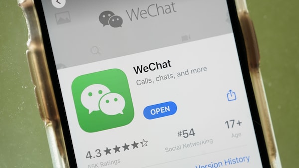 WASHINGTON, DC - AUGUST 07: In this photo illustration, the WeChat app is displayed in the App Store on an Apple iPhone on August 7, 2020 in Washington, DC. On Thursday evening, President Donald Trump signed an executive order that bans any transactions between the parent company of TikTok, ByteDance, and U.S. citizens due to national security reasons. The president signed a separate executive order banning transactions with China-based tech company Tencent, which owns the app WeChat. Both orde