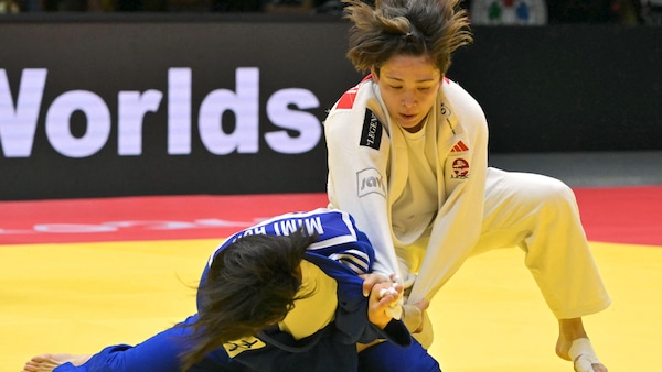 Christa Deguchi affronte Mimi Huh sur le tatami.