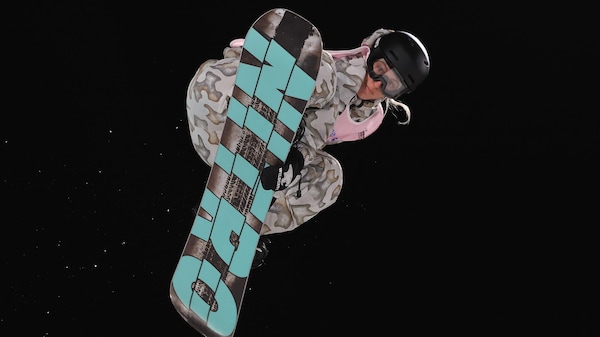 Laurie Blouin effectue une figure dans les airs en tenant sa planche à neige.