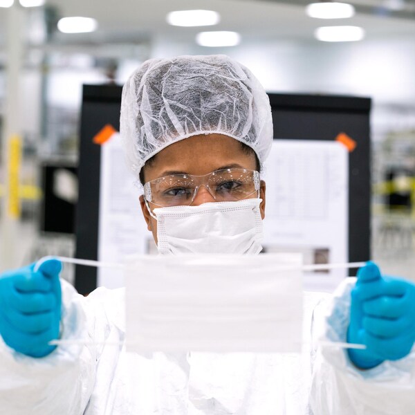 Workers begin final preparation for manufacturing Level 1 face masks Wednesday, April 1, 2019 at the General Motors facility in Warren, Michigan. (Photo by John F. Martin for General Motors)