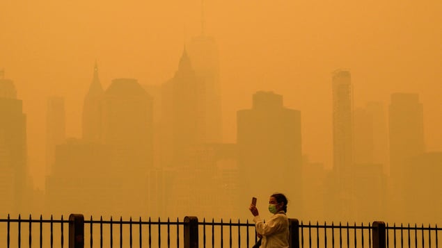 Hazy skies veil the New York City skyline.