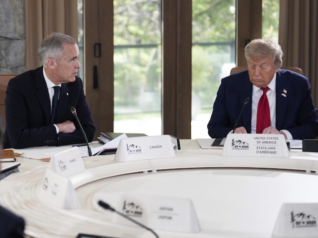 The leaders are seated around a round table to start the G7 discussions. carney renounces taxing digital giants