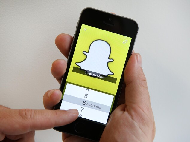 LONDON, ENGLAND - OCTOBER 06:  In this photo illustration the Snapchat app is used on an iPhone on October 6, 2014 in London, England. Snapchat allows users' messages to vanish after seconds. It is being reported that Yahoo may invest millions of dollars in the start up firm.  (Photo by Peter Macdiarmid/Getty Images)