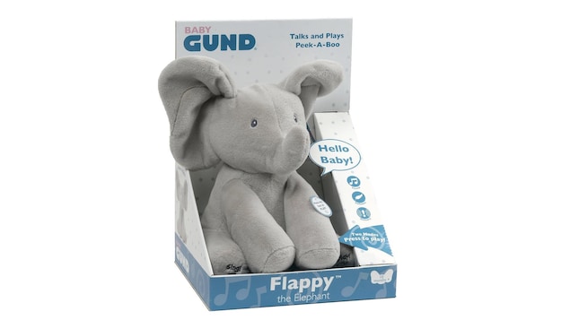 Une peluche en forme d'éléphant dans sa boîte originale.