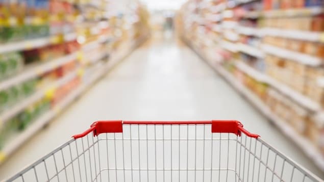 A stock image of a shopping cart in supermarket aisle. The supposed 'grocery cart theory' proposes that returning your cart is a litmus test of your character. A new video by a mom who says she never returns her cart has enraged the internet. 