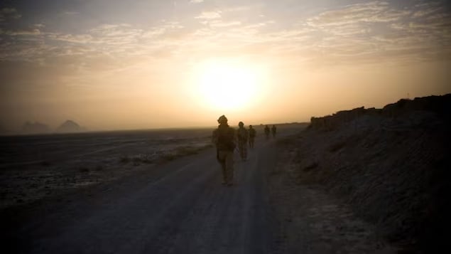 Canadian soldiers patrol in the early morning outside Salavat, southwest of Kandahar, Afghanistan, on Saturday, Sept. 11, 2010. Canadian soldiers were deployed to Kandahar province as part of the country’s mission in Afghanistan. Canada's combat role ended in 2011. 