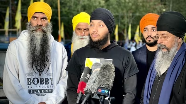 Balraj Singh Nijjar, centre, the son of slain gurdwara president Hardeep Singh Nijjar, said the prime minister's accusation that the Indian government was involved in his father's death came as a relief. (Gian Paolo Mendoza/CBC)
