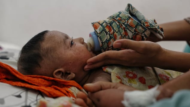 Seven-month-old Tanvir Mahmud was one of many children being treated for measles at hospital in Bangladesh's capital Dhaka on Wednesday, as the country endures a major outbreak that some experts attribute to lagging vaccination rates in recent years. 