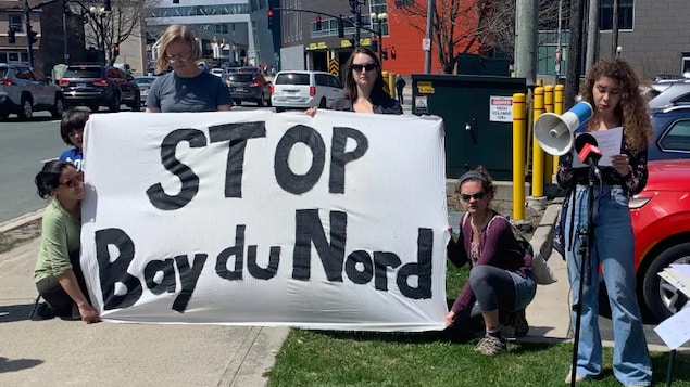 A group of demonstrators outside Equinor's offices in Newfoundland and Labrador in May protest the approval of the Bay du Nord oil project. (Ted Dillon/CBC)